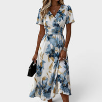 Elara | Vestido midi cruzado con estampado floral