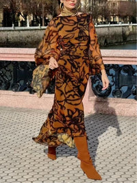 Vestido comprido castanho estampado com mangas largas